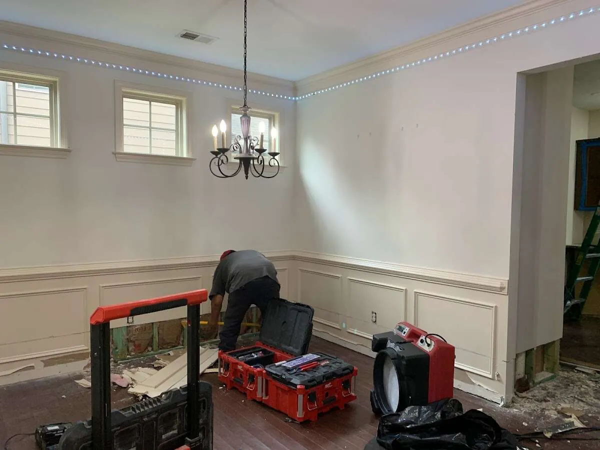 Restoration technician with professional equipment in Southington